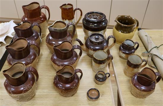 A large collection of 19th century stoneware harvest jugs, etc.